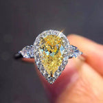 Load image into Gallery viewer, 2ctw Yellow Moissanite Pear Cut Halo Engagement Ring 18k White Gold
