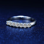 Load image into Gallery viewer, Classic 7 Stone Moissanite Wedding Band 0.7CTW
