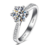 Load image into Gallery viewer, 1ct Round Moissanite Ring with Sidestones 18k White Gold
